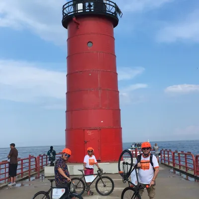 a bicycle is parked next to a body of water