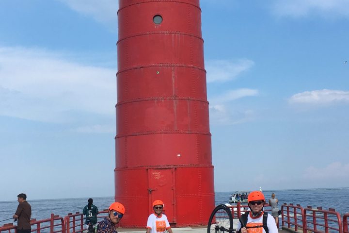 a bicycle is parked next to a body of water